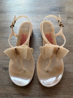 Salvatore Ferragamo Ivory Bow Jelly T-Strap Sandals